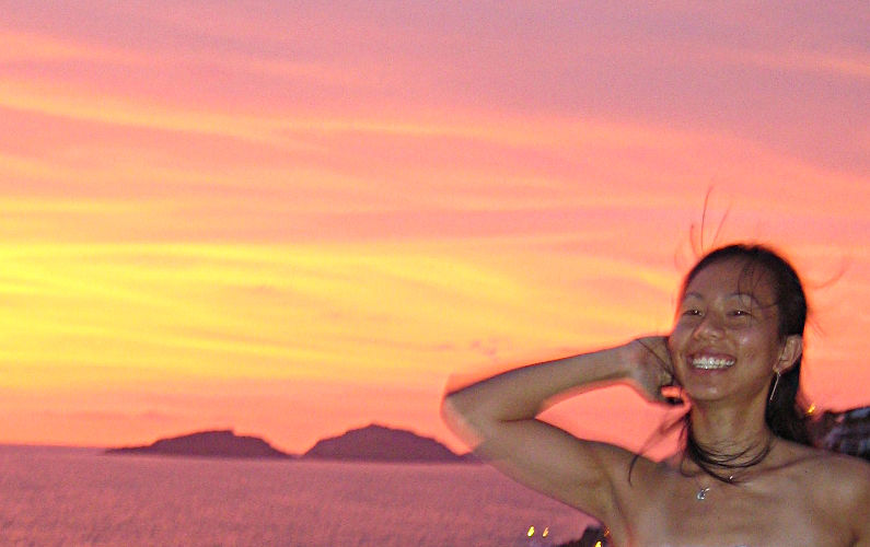 Nadia Posing with Her Hand to Her Hair in the Dying Sunlight of Sunset Overlooking Mazatlán Coastline