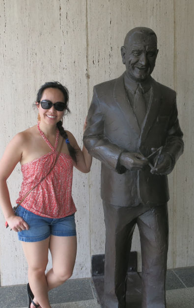 Nadia with a Statue of President Lyndon B Johnson