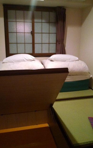 Capsule Ryokan Kyoto Beds That Flip Up for Luggage Storage