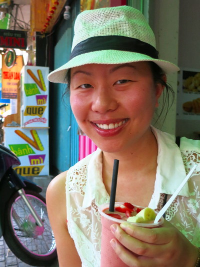 Nadia with Her Fruit Smoothie at Banana's Juice Shop Saigon