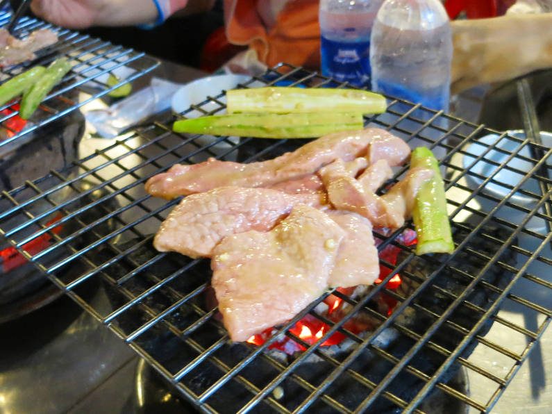 Grilling Meat and Okra During XO Tours Saigon